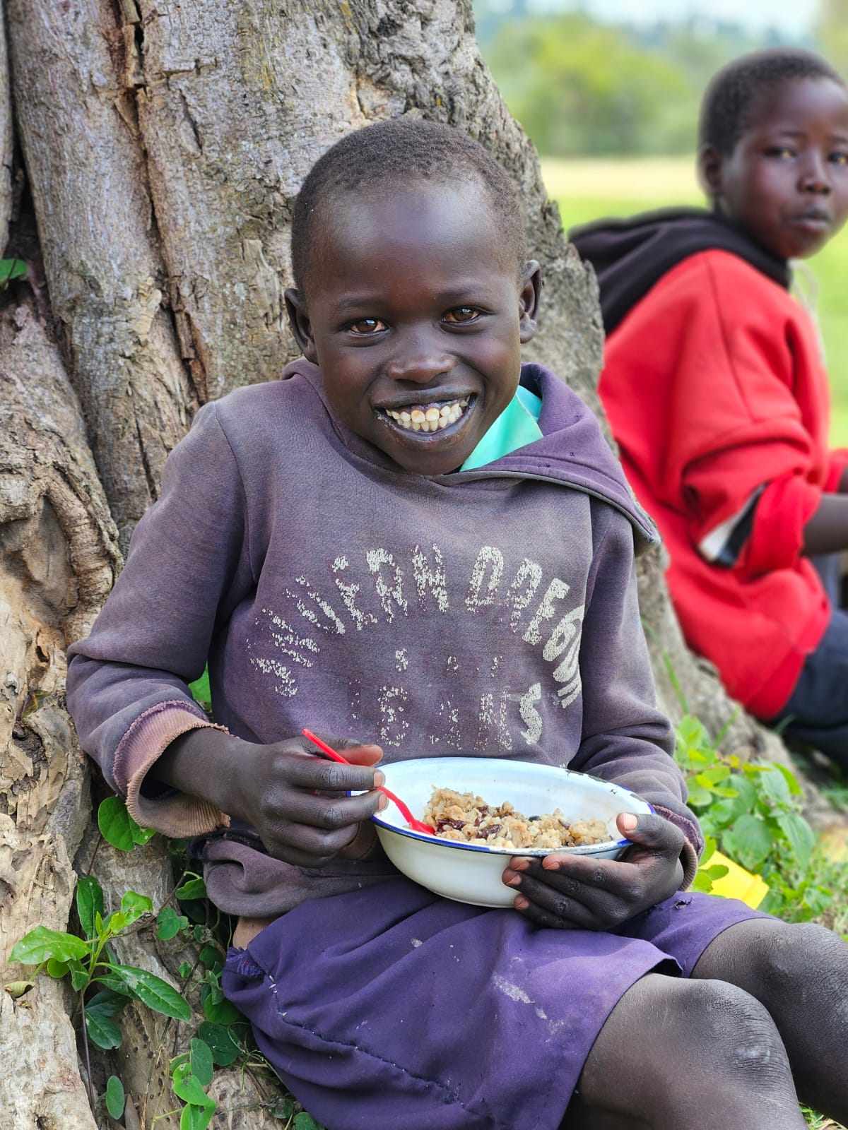 Children eating porridge